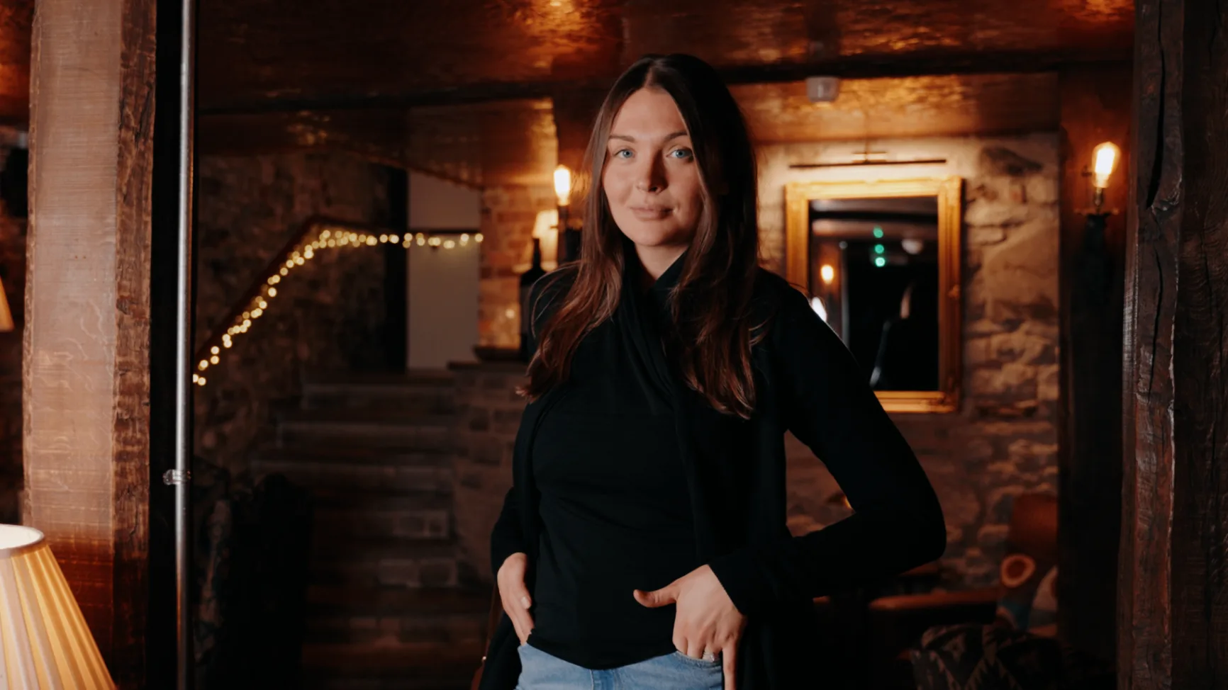 Kate Bell wearing an Alternity layer in a warm lifestyle portrait