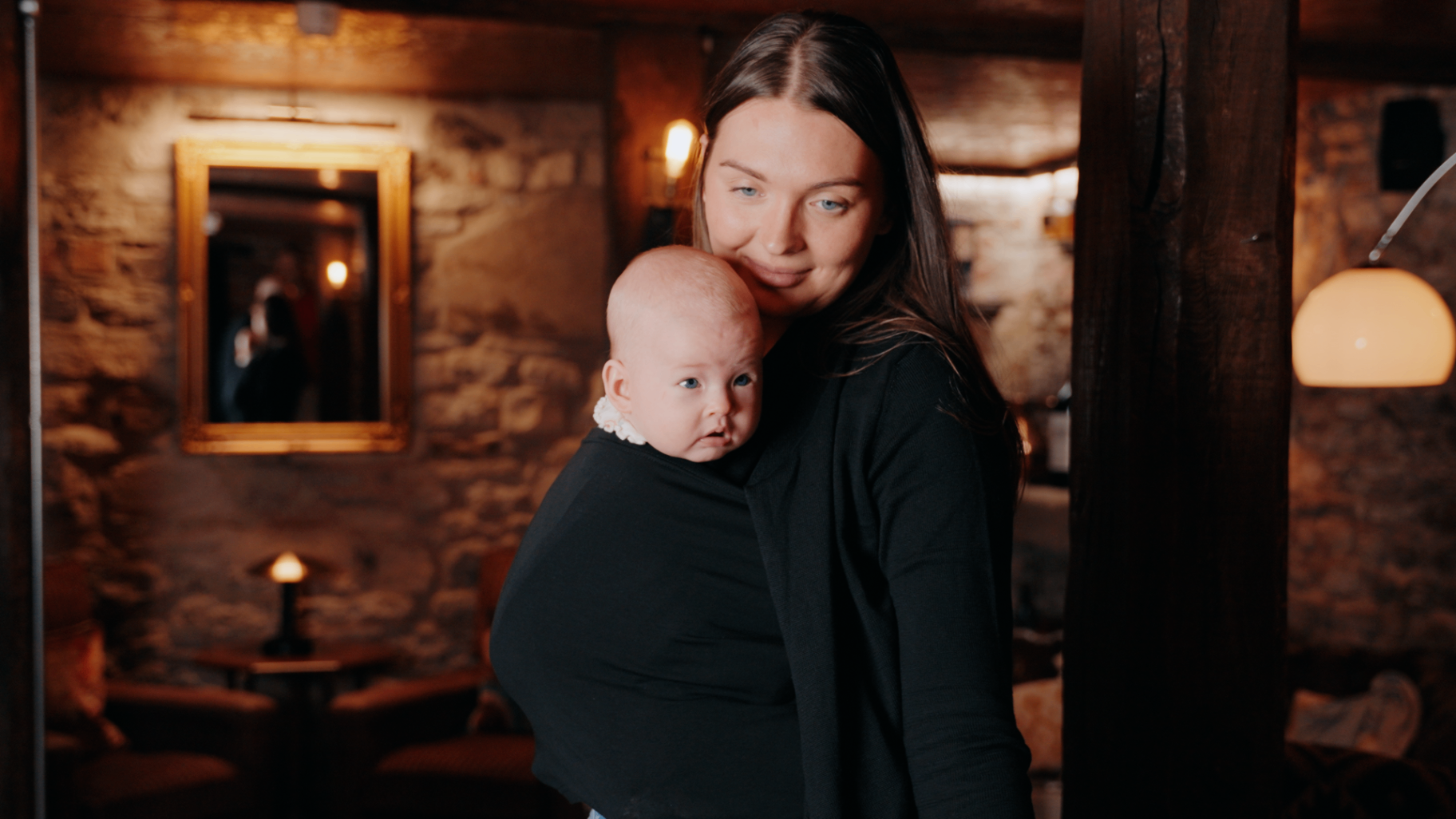 Mother carrying her baby in the Alternity Cariagan